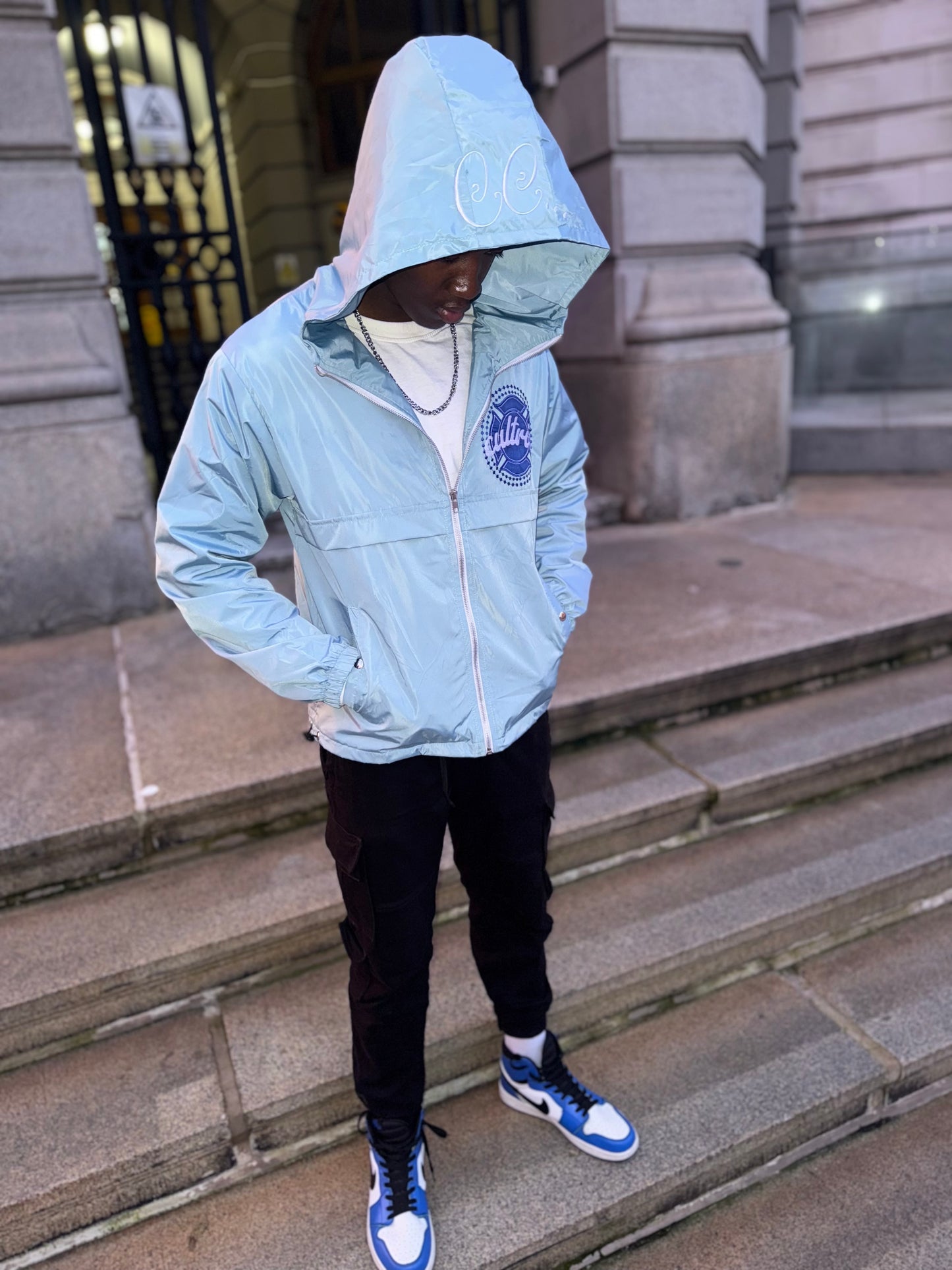 Light Blue "God Above All" Cultrix Windbreaker