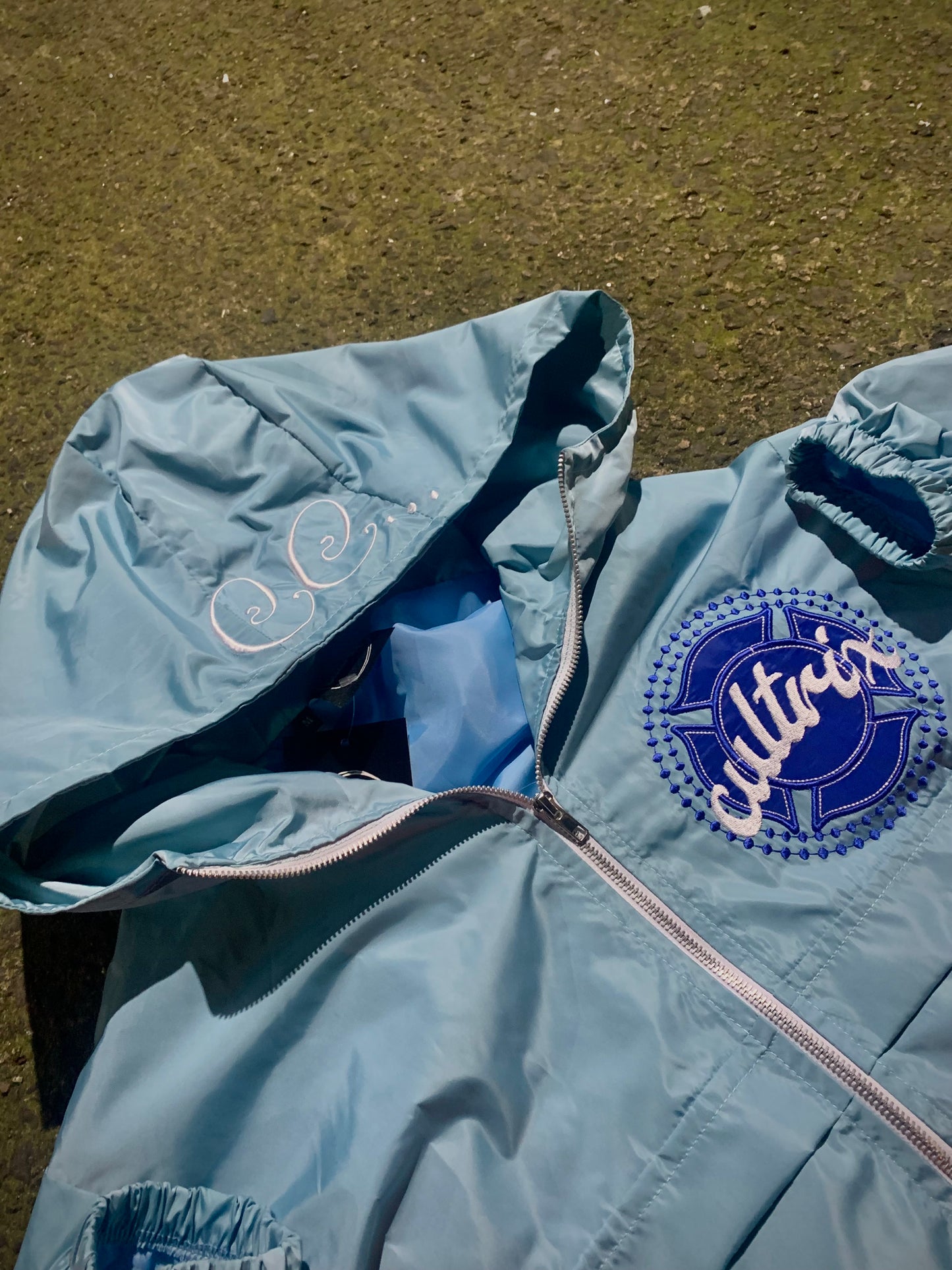 Light Blue "God Above All" Cultrix Windbreaker