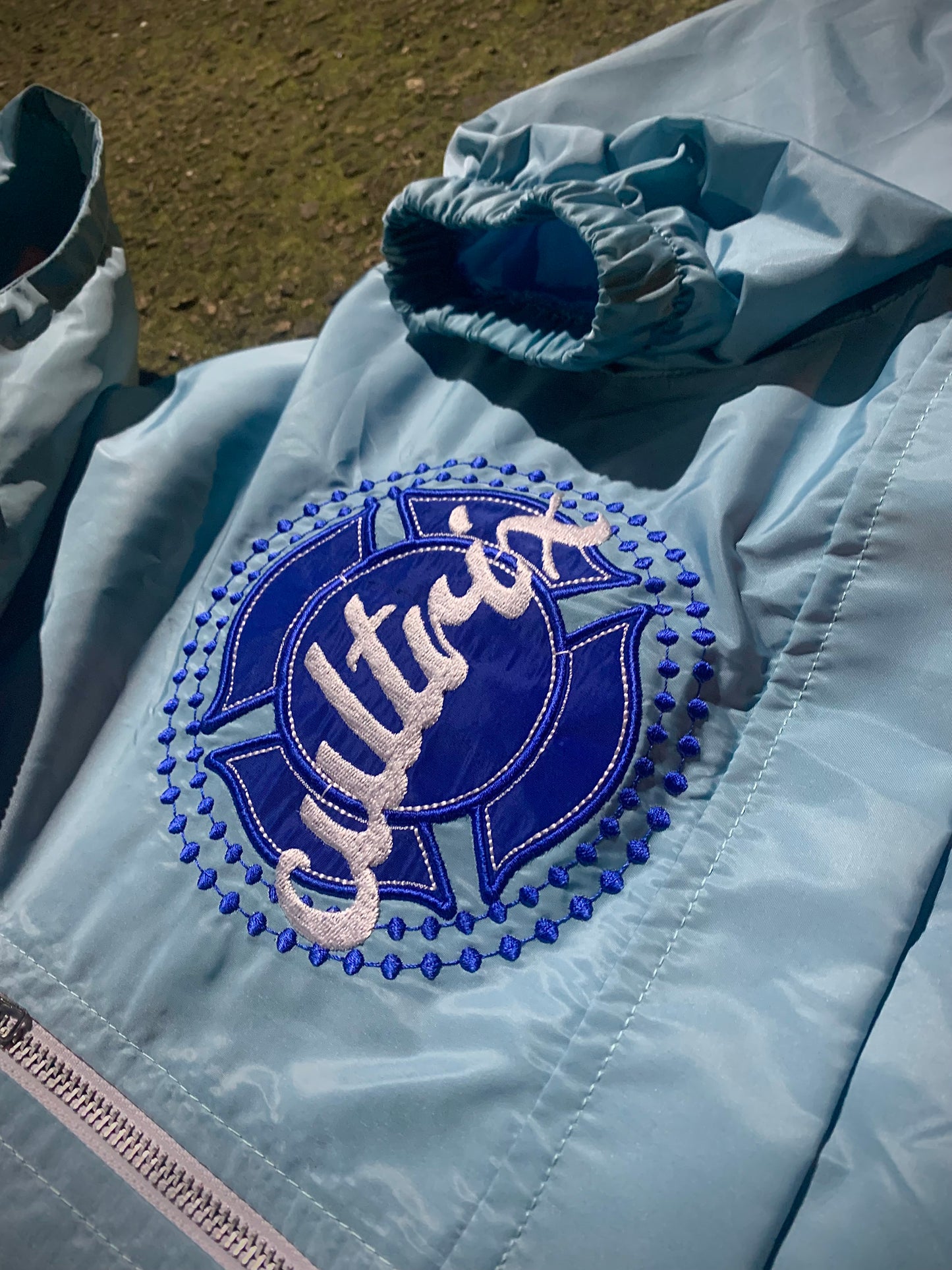 Light Blue "God Above All" Cultrix Windbreaker